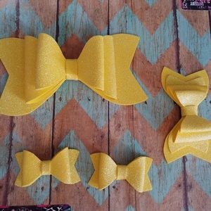 Water resistant yellow hair bows